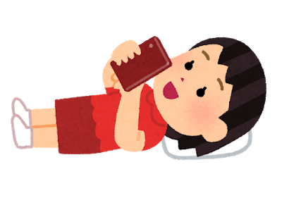 寝転がってスマホを使う人のイラスト