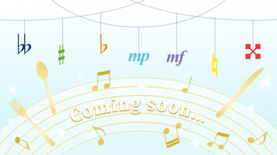 ココス公式Xが投稿した7色の音楽記号が並ぶティザー画像